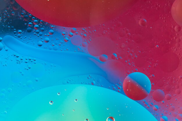 Air bubbles over the red and blue background