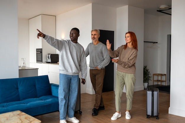 Free photo airbnb host welcoming guests