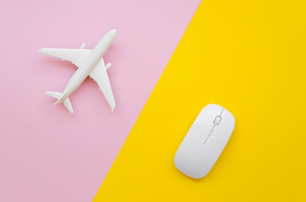 Airplane and mouse on table