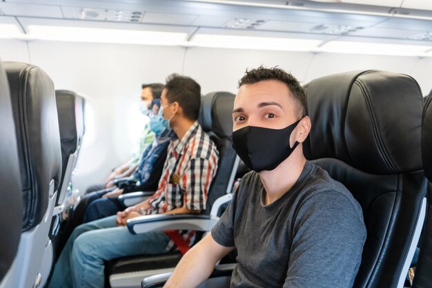 Download Premium Photo Medical Mask Travel Airplanes Yellow Background Problems Traveling By Covid 19 PSD Mockup Templates