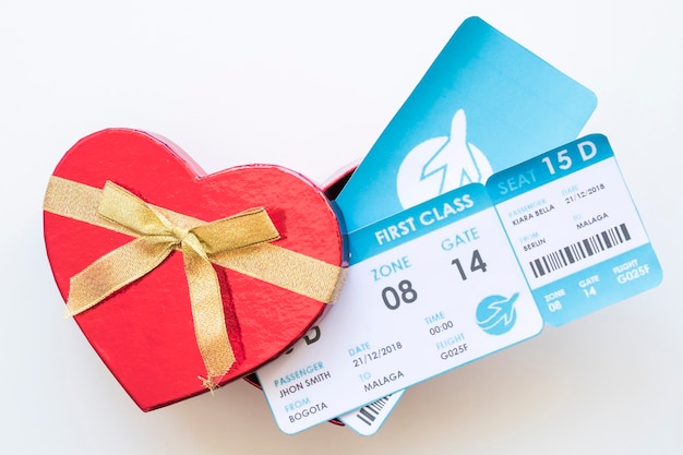 Free photo airplane tickets in gift box