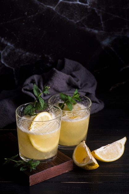 Alcoholic beverage cocktail with lemon luxury background