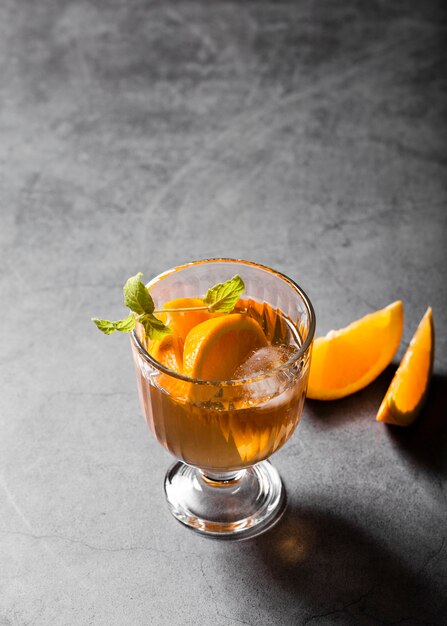 Alcoholic beverage with orange slices