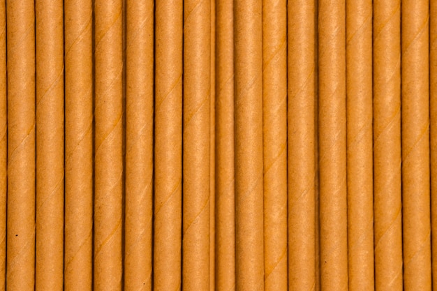 Free photo aligned straw collection on table