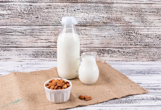 Almond and milk in a white bowl