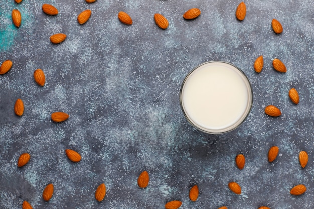 Almond milk with almond, top view