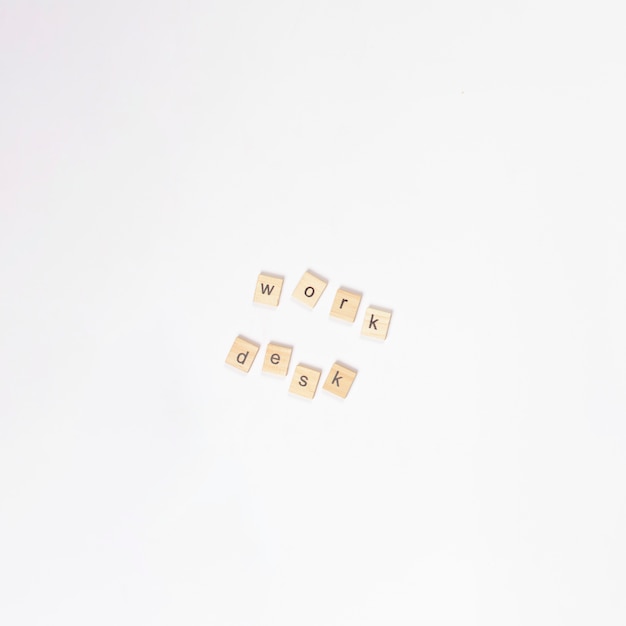 Alphabet work desk wooden blocks on white background