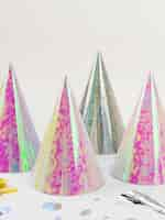 Free photo aluminium birthday hats and confetti