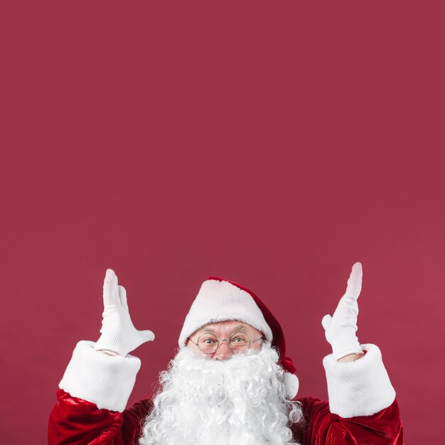 Amazed Santa Claus with hands up