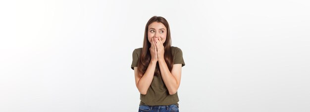 Amazement woman excited looking to the side surprised happy young woman looking sideways in exciteme