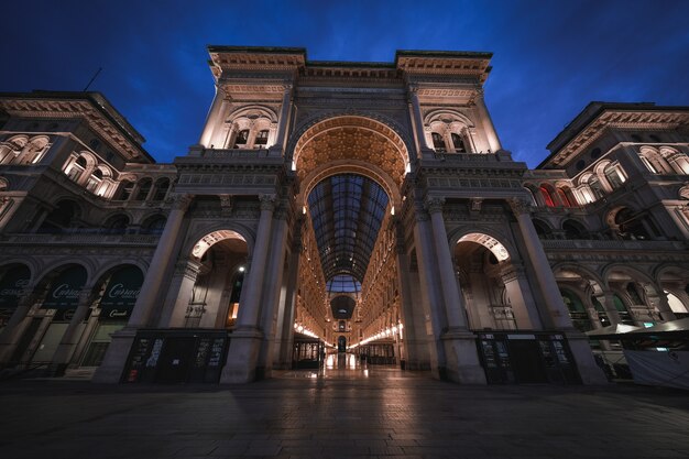 Amazing shot of the Galleria Vittorio Emanuele II's amazing architecture on a night sky distance