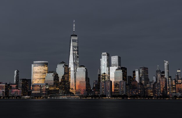 Amazing shot of the high modern skyscrapers of the city skyline at night