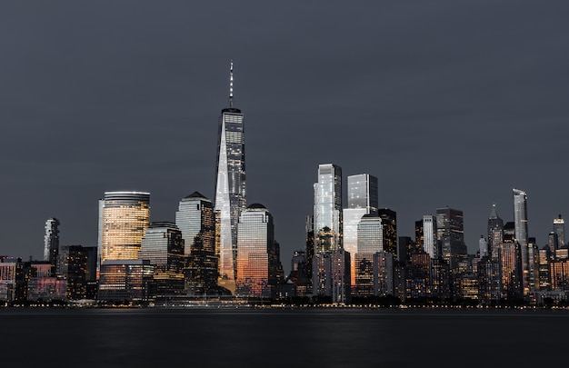 Amazing shot of the high modern skyscrapers of the city skyline at night