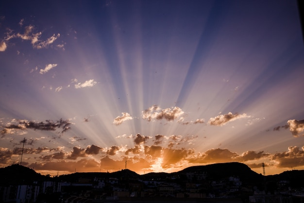 Free photo amazing sunset with last rays of sunlight