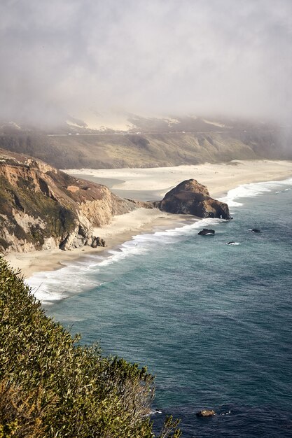 Amazing vertical shot of Little Sur River Beach, Big Sur, California, USA