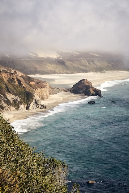 Amazing vertical shot of Little Sur River Beach, Big Sur, California, USA