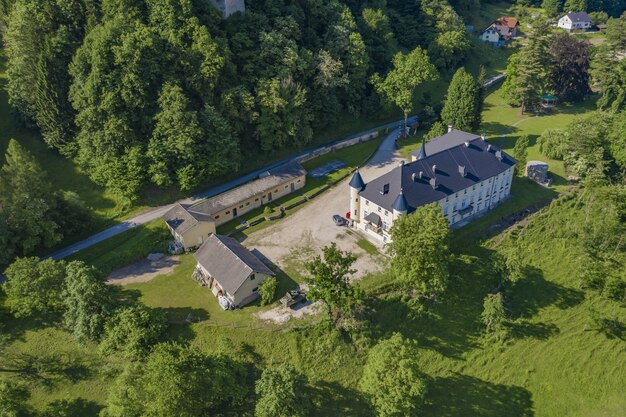 Amazing view of the Bukoje Manor in Slovenia surrounded by trees