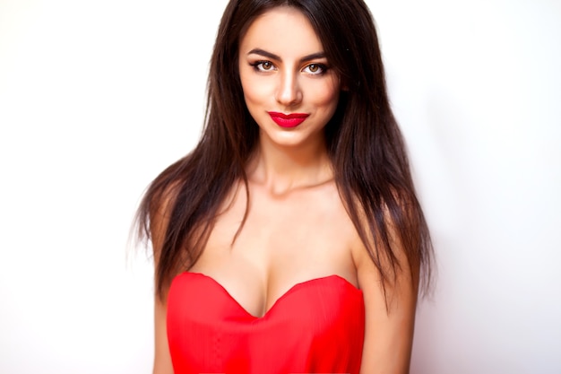 Amazing young woman red dress and makeup