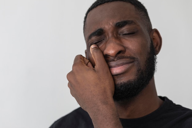 American black person crying close-up