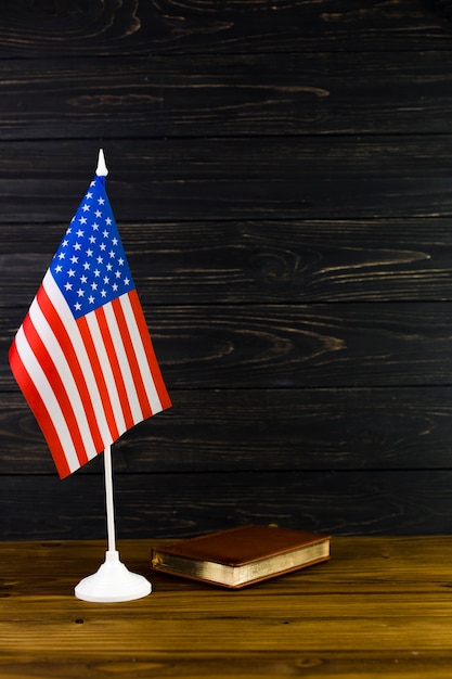 American flag background with book