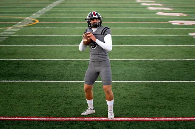 American male football player in uniform on the field