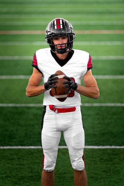 American male football player in uniform on the field