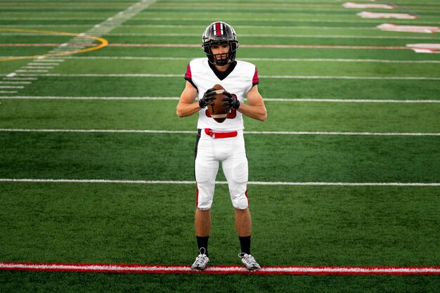 American male football player in uniform on the field