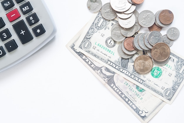 American money dollar with calculator on white background with copy space