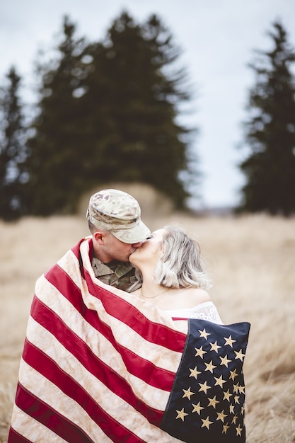 American soldier kissing his loving wife