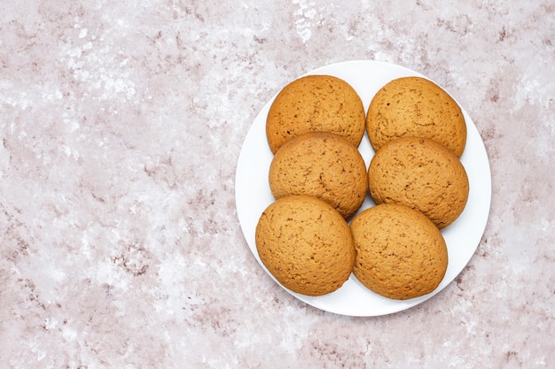 American style peanut butter cookies on light concrete background.