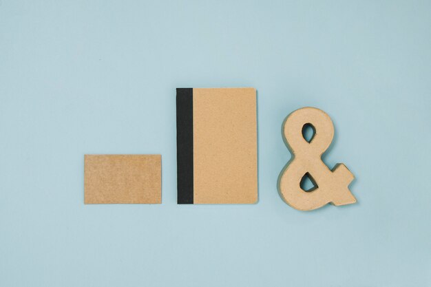 Ampersand near notebook and paper card