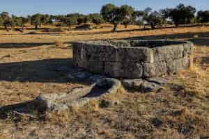 Free photo ancient well in the dehesa de la luz, extremadura, spain