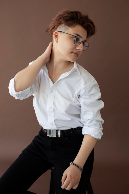 Androgynous teen in stylish clothes