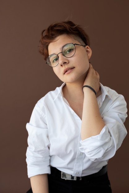 Androgynous teen in stylish clothes