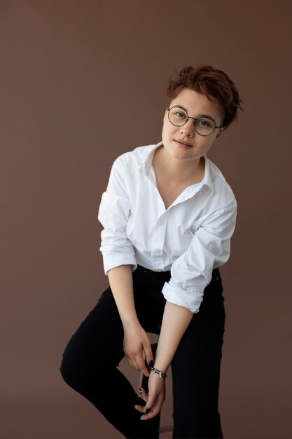 Androgynous teen in stylish clothes