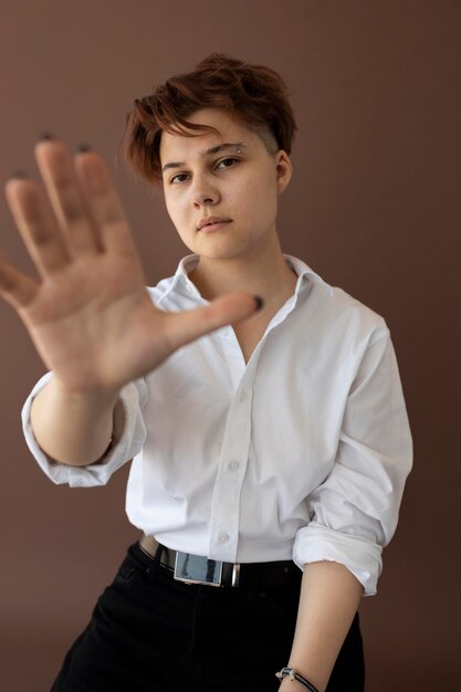 Androgynous teen in stylish clothes