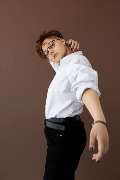 Free photo androgynous teen in stylish clothes