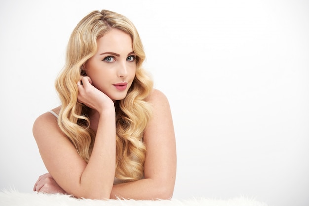 Angelic Young Woman Posing on White