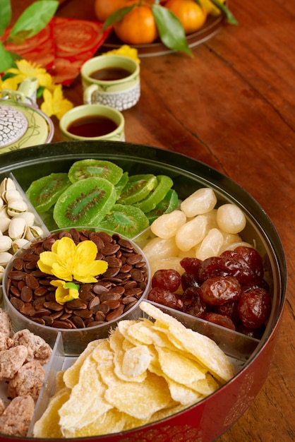 Angle view of new year snack box standing on the decorated holiday dinner table