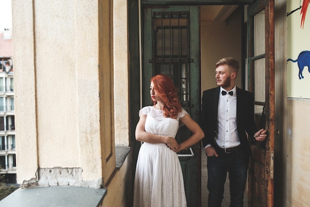 Angry bride with hands on waist