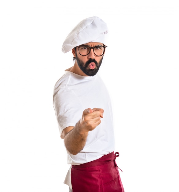 Angry chef shouting over white background