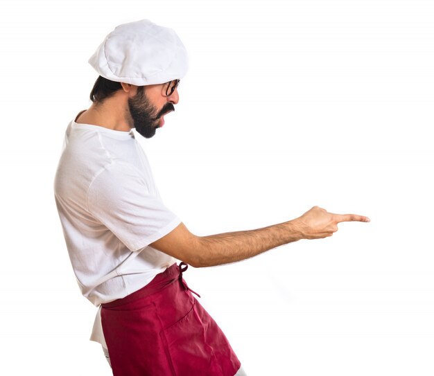 Angry chef shouting over white background