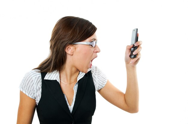 Angry employee looking at her phone