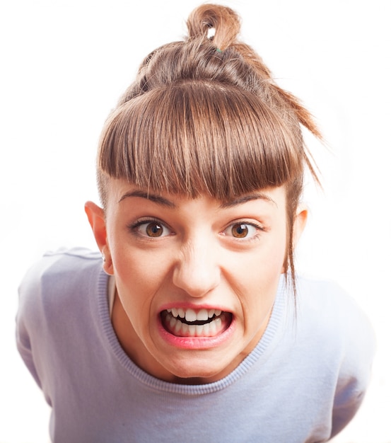 Angry girl showing her teeth