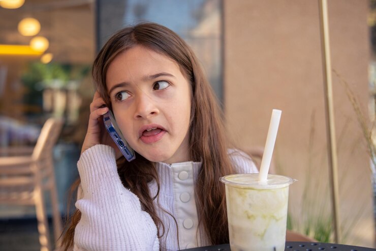 Free Photo angry girl talking on the phone a girl with a phone