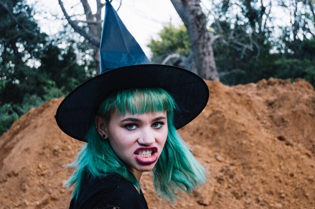 Angry witch in forest