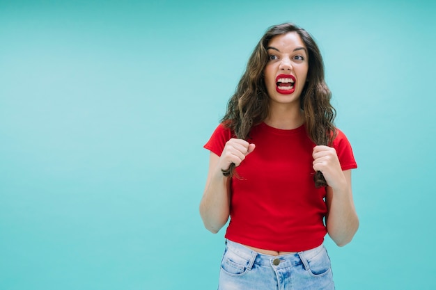 Free photo angry young woman pulling her hair