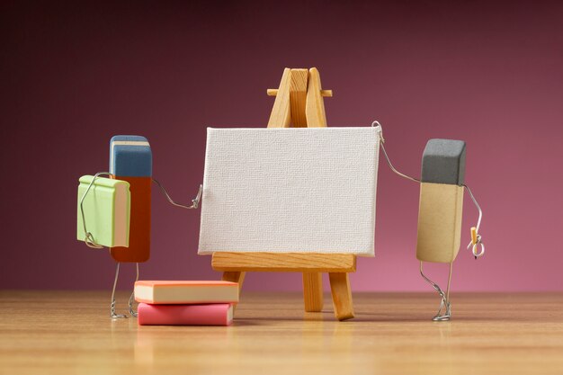 Animated eraser painting on blank easel still life