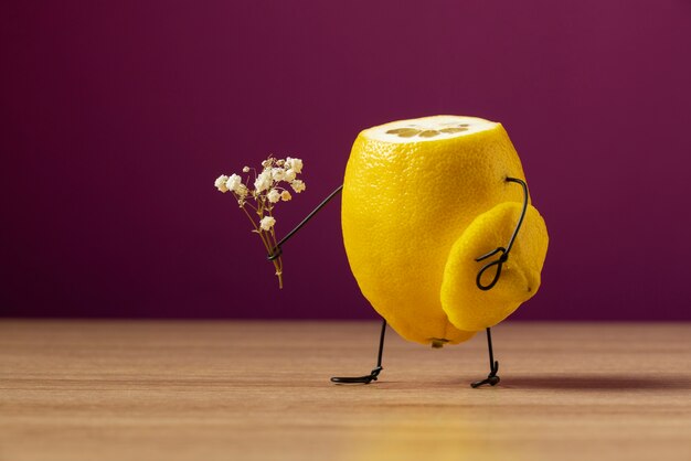 Animated lemon holding plant still life