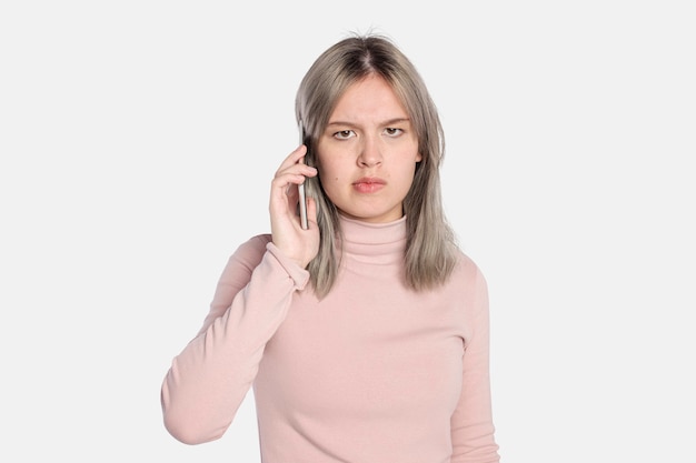 Annoyed young woman on a call